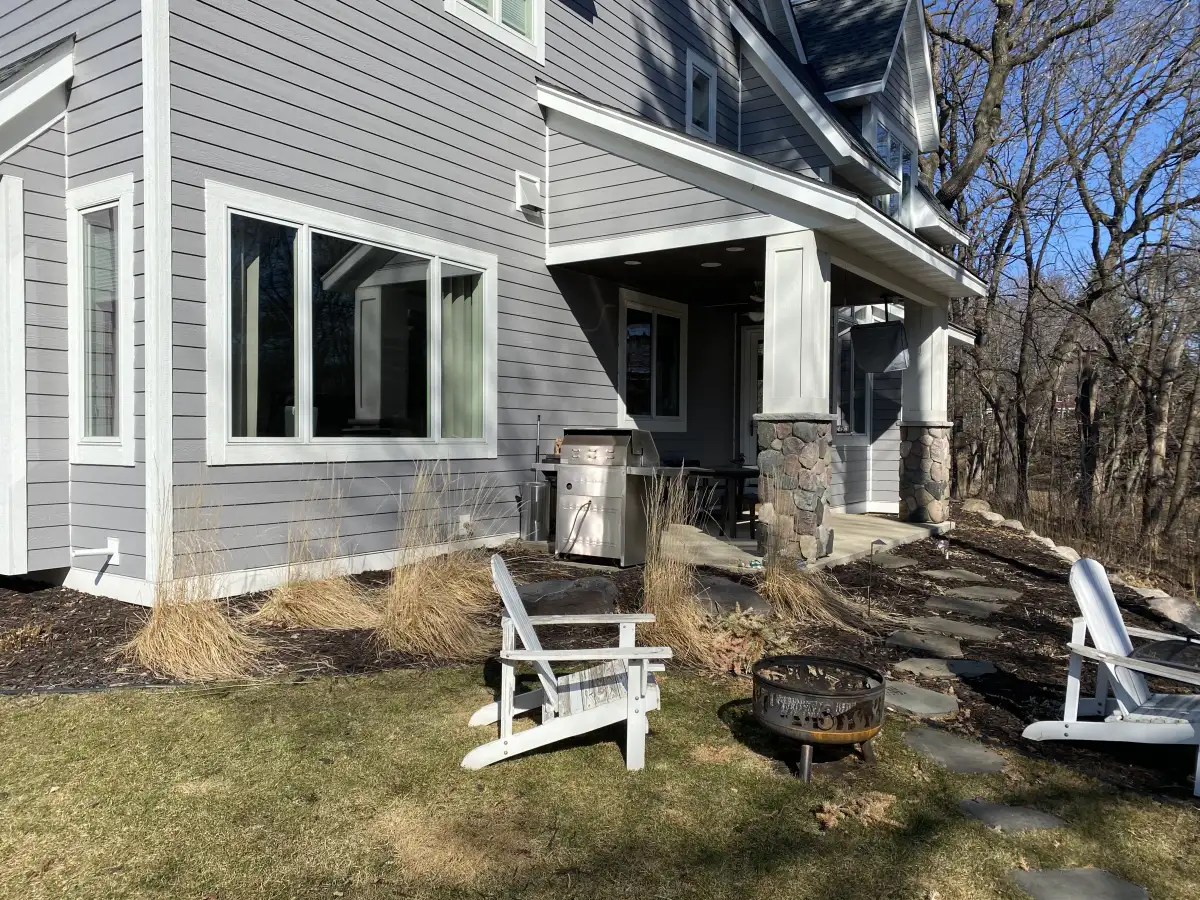 Backyard pool area after complete landscape transformation