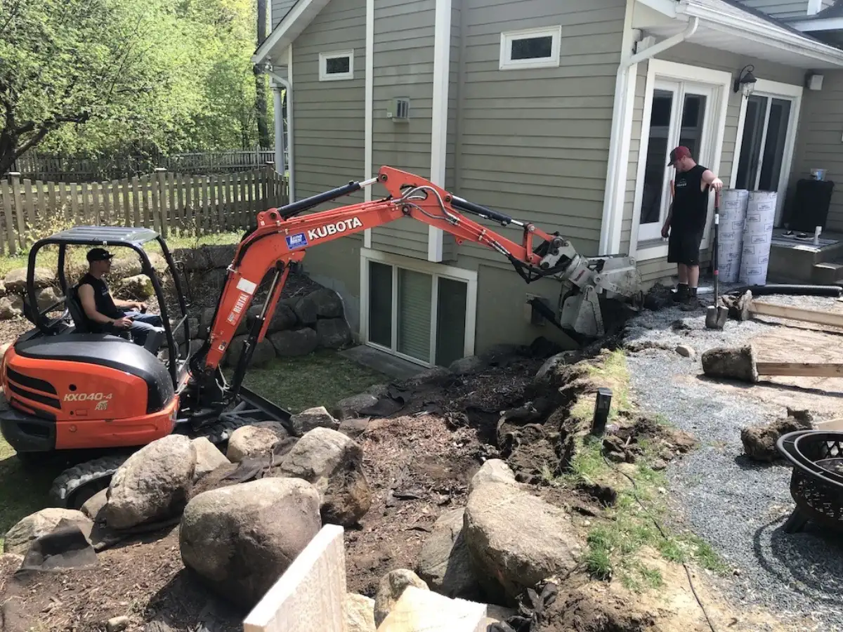 Boulder wall construction in progress