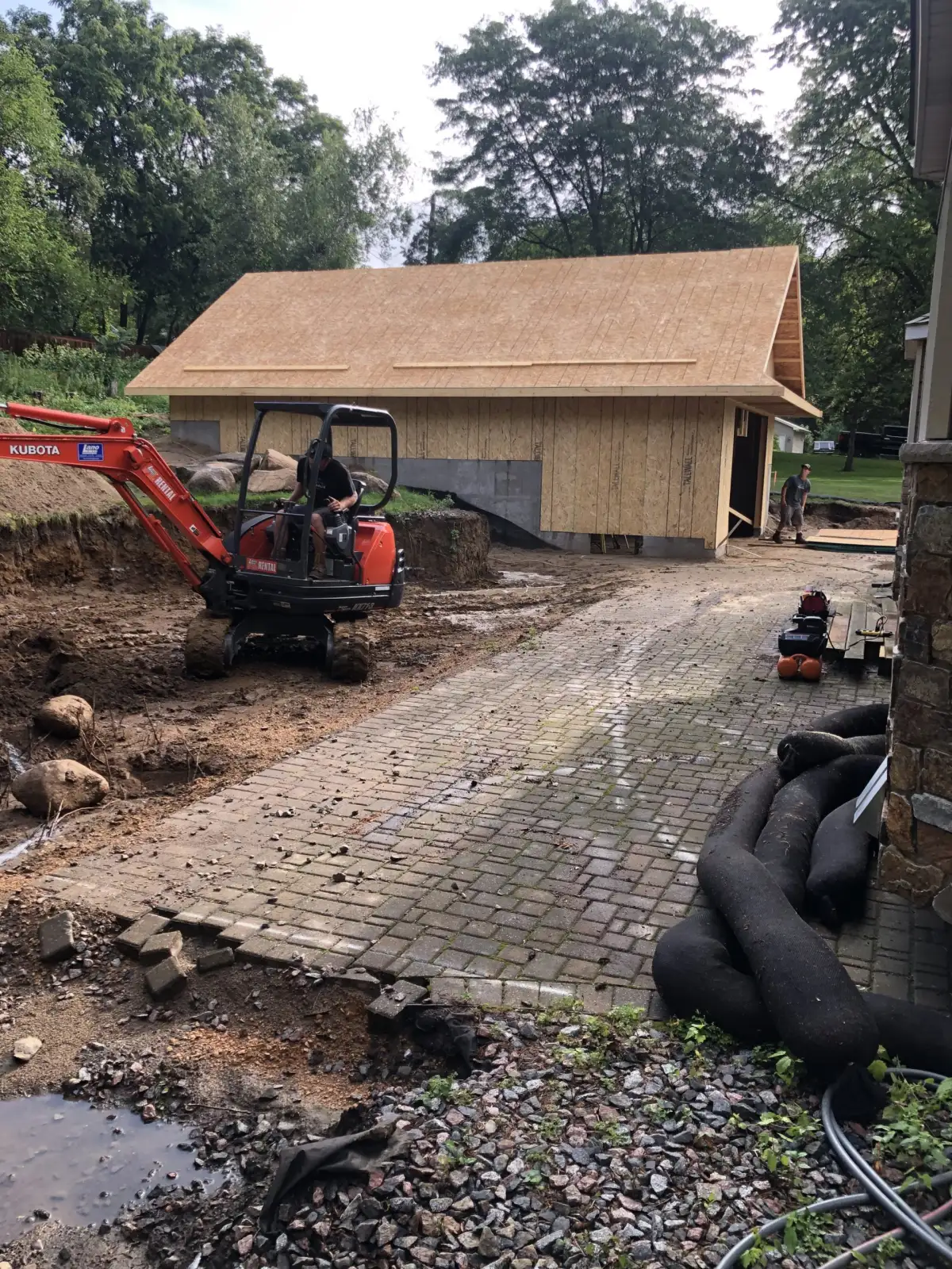 Landscape Charlie team during site excavation and preparation