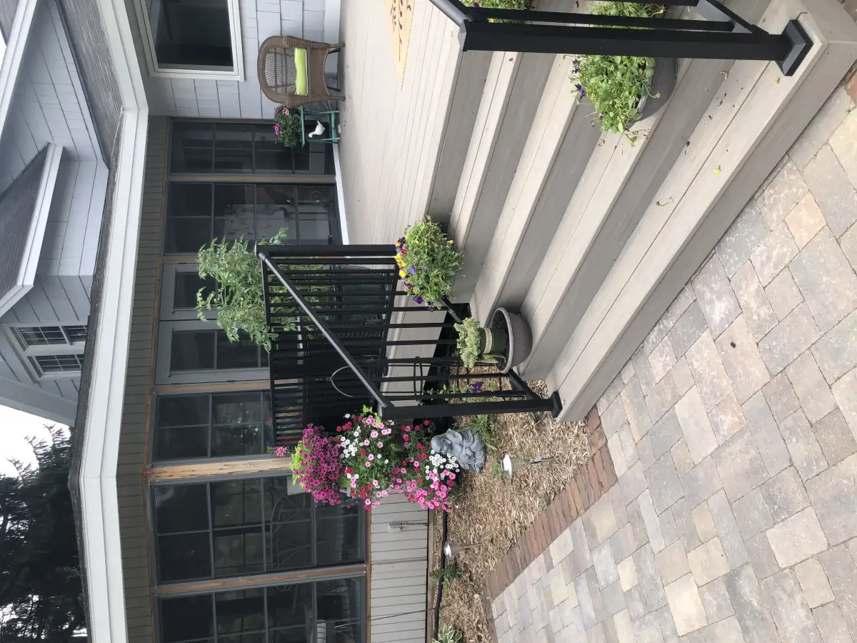 Low-profile deck connected to paver patio in Eden Prairie