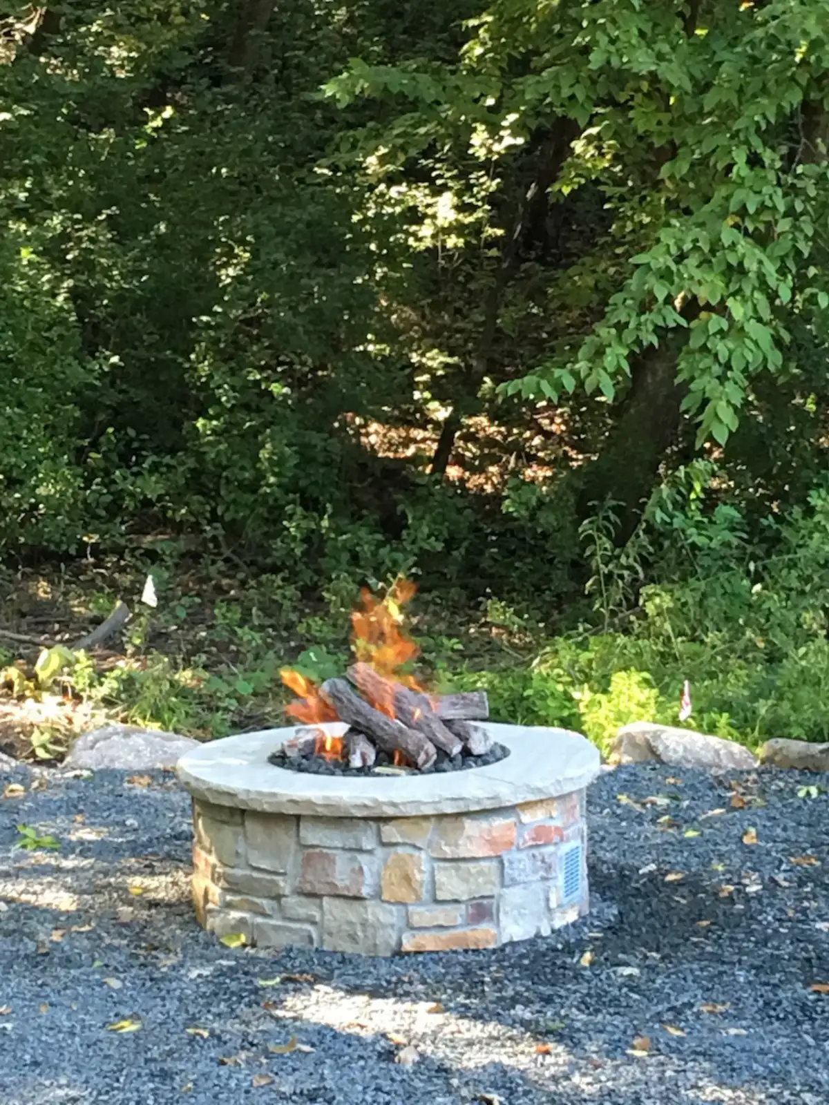 Custom fire feature with evening lighting