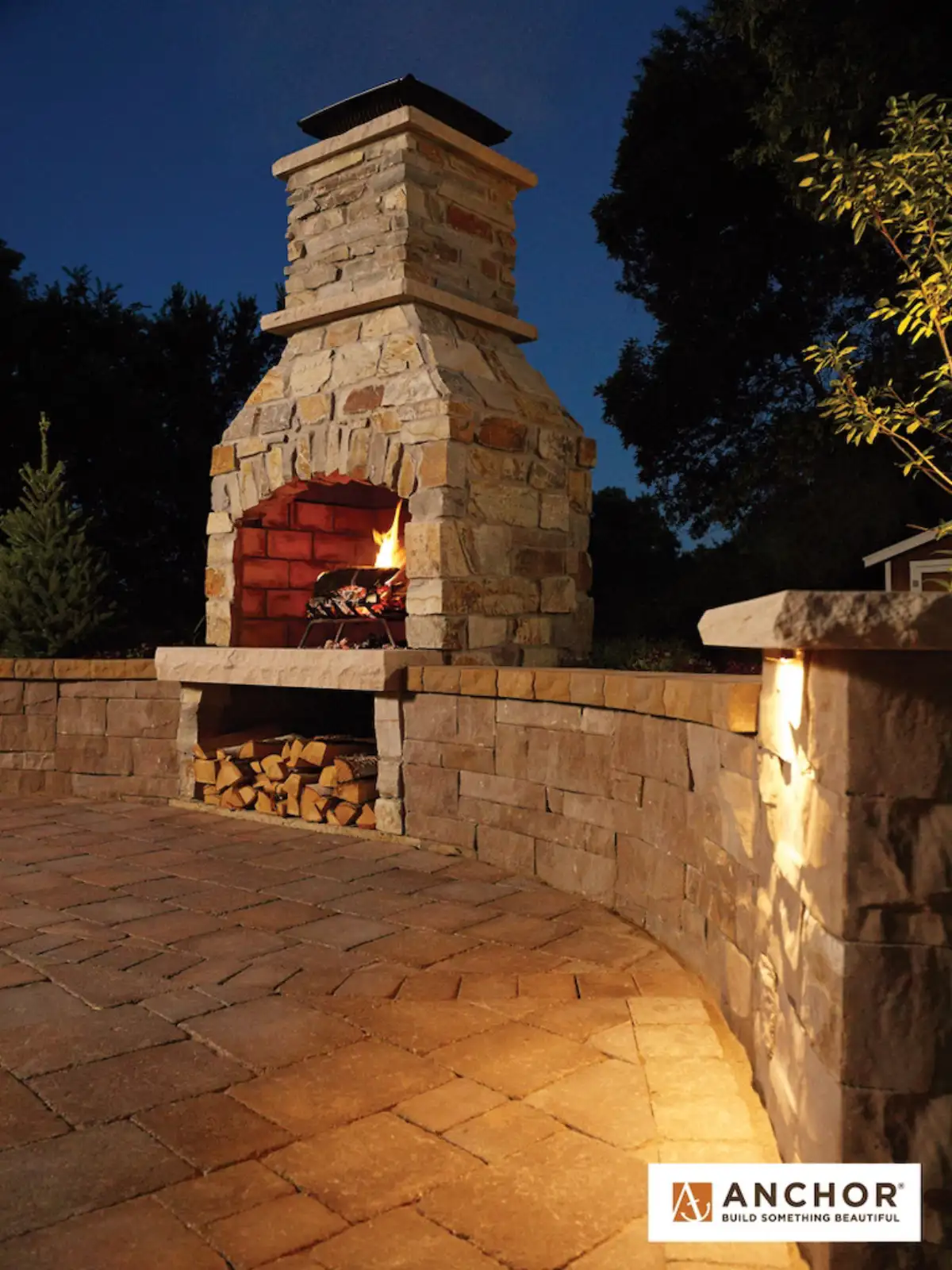 Outdoor fireplace with stone veneer