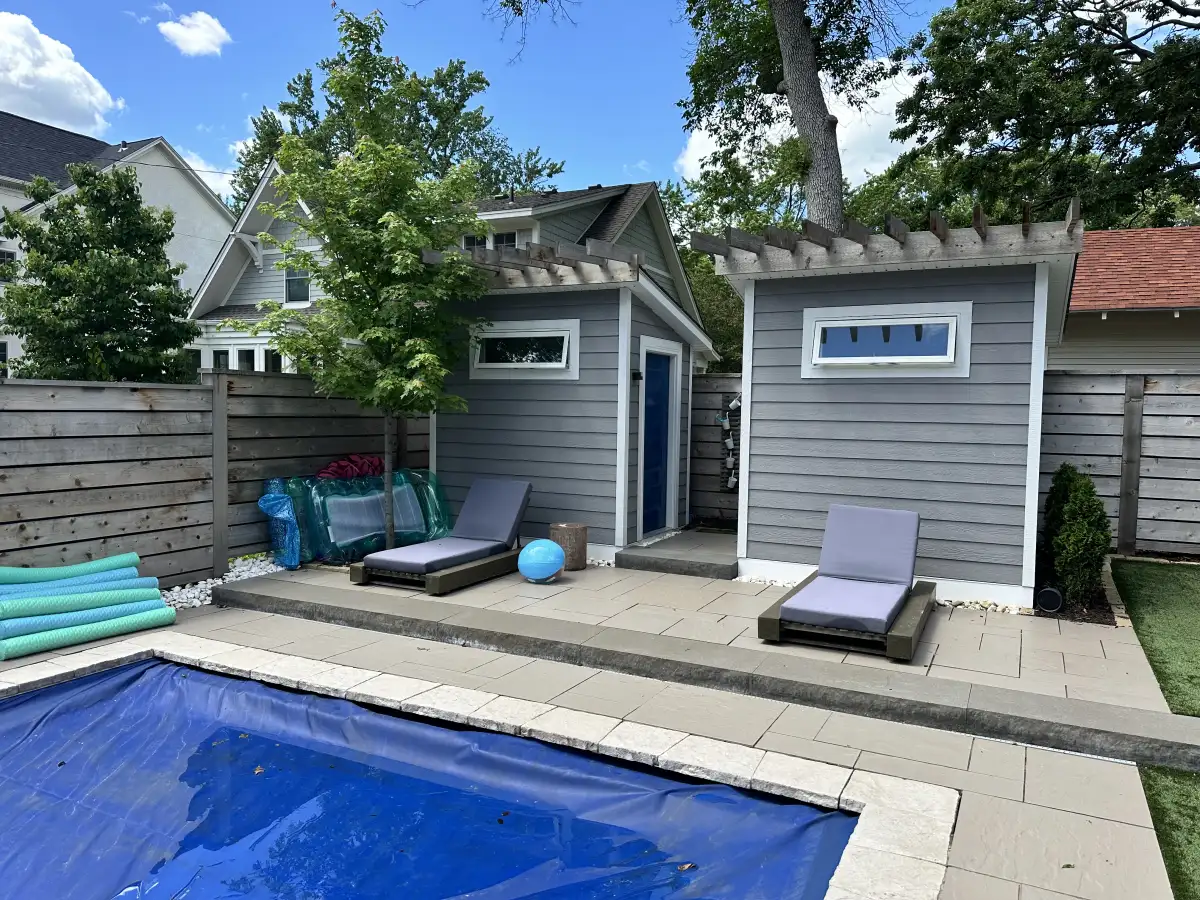 Legacy tier pool house with paver deck and lounge chairs — $150K+ outdoor living transformation by Landscape Charlie