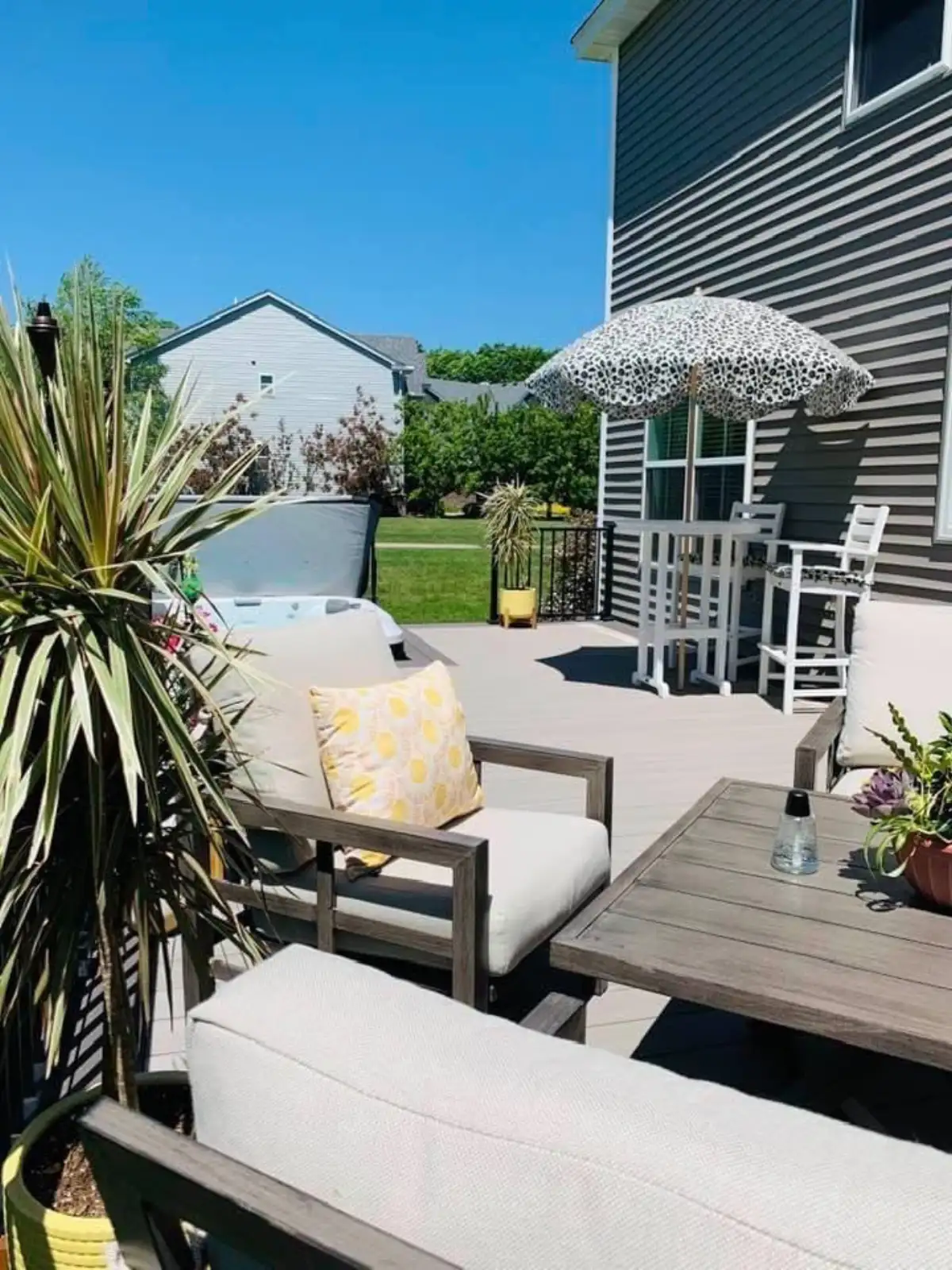 Softscape plantings integrated with paver patio and boulder outcroppings