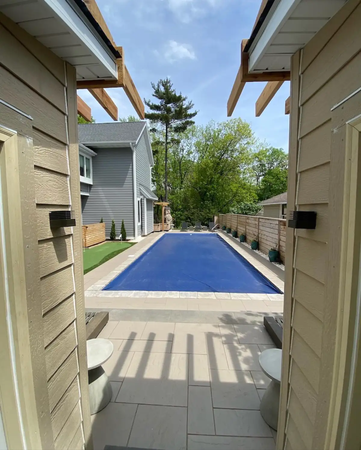 Backyard outdoor living transformation with paver patio and pergola