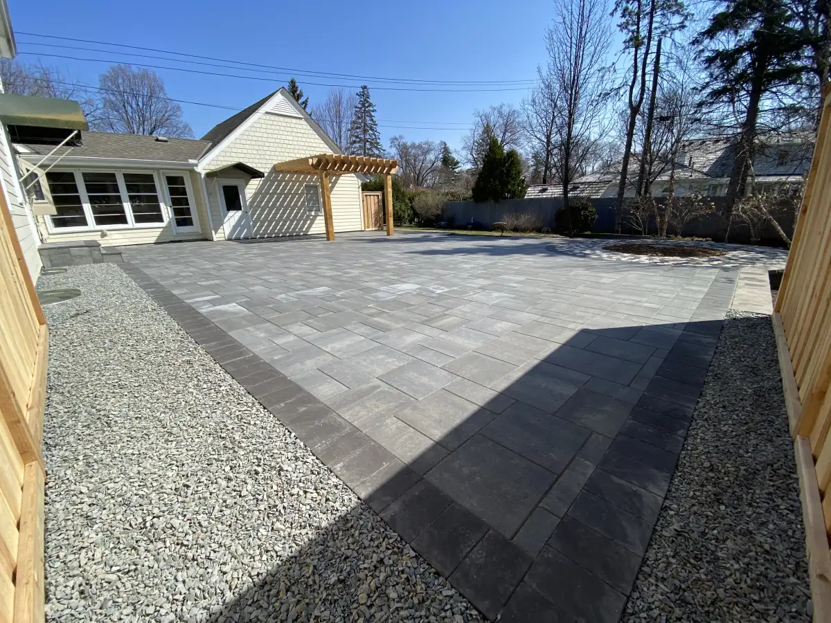 Belgard paver patio with circular fire pit and seating area