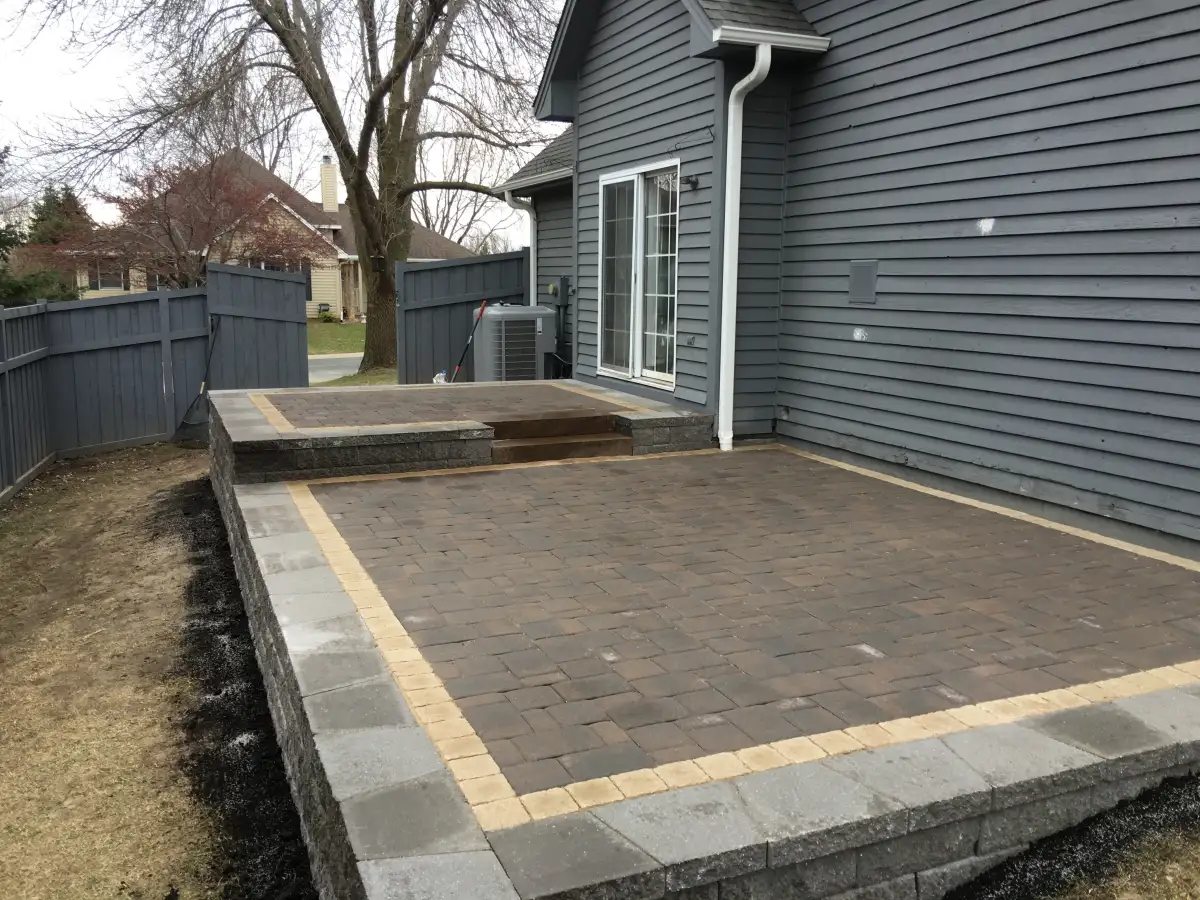 Large format paver patio with fire pit area in Eden Prairie MN
