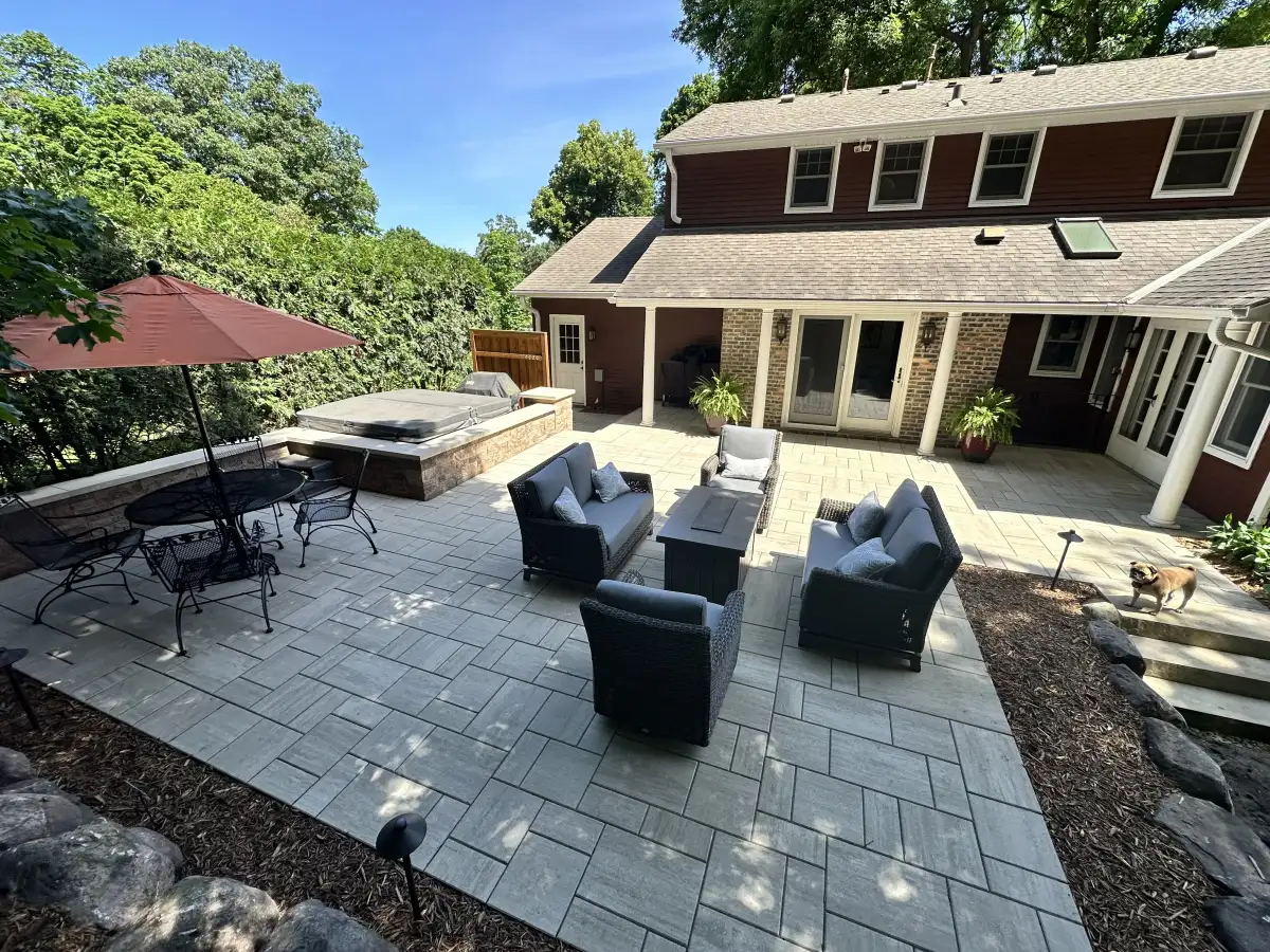 Custom patio with decorative border and integrated lighting