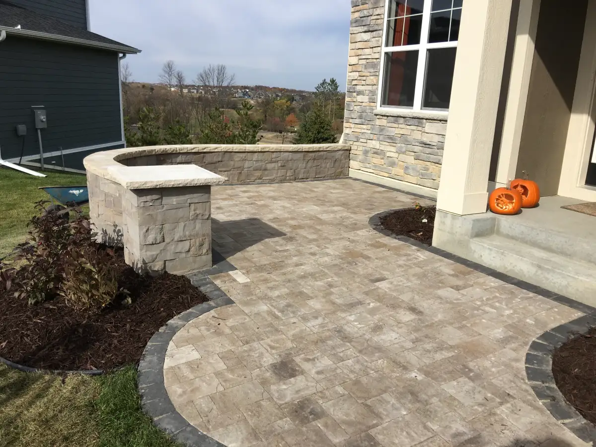 Paver patio with outdoor dining space near Lake Minnetonka
