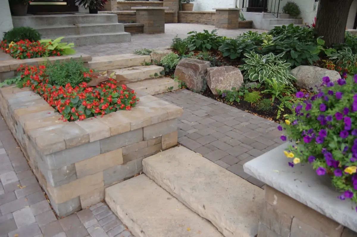 Curved paver steps leading to backyard patio in Eden Prairie