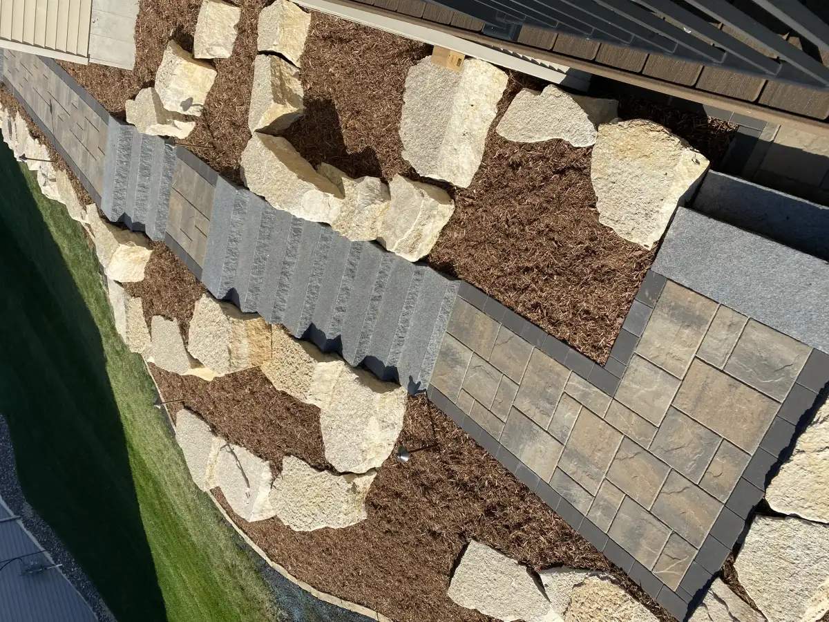 Grand entry steps with block retaining wall and uplighting